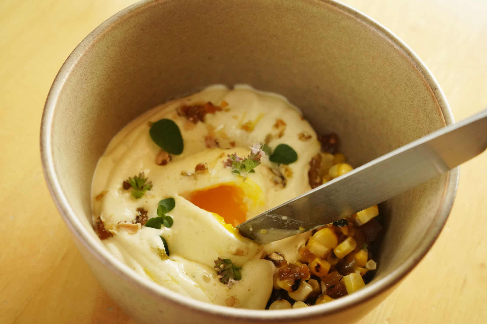 Corn, poached egg, and pepitas at Villa Coffee House